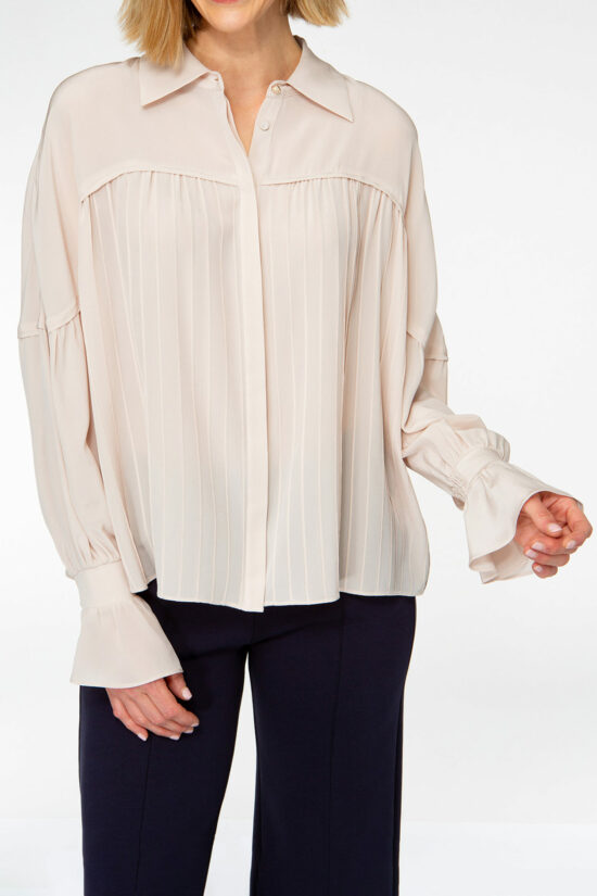 IVI collection rose blouse with pleat detail in the font and back with a golden button at the top made from silk and ruffle details on the sleeve from aw24 collection