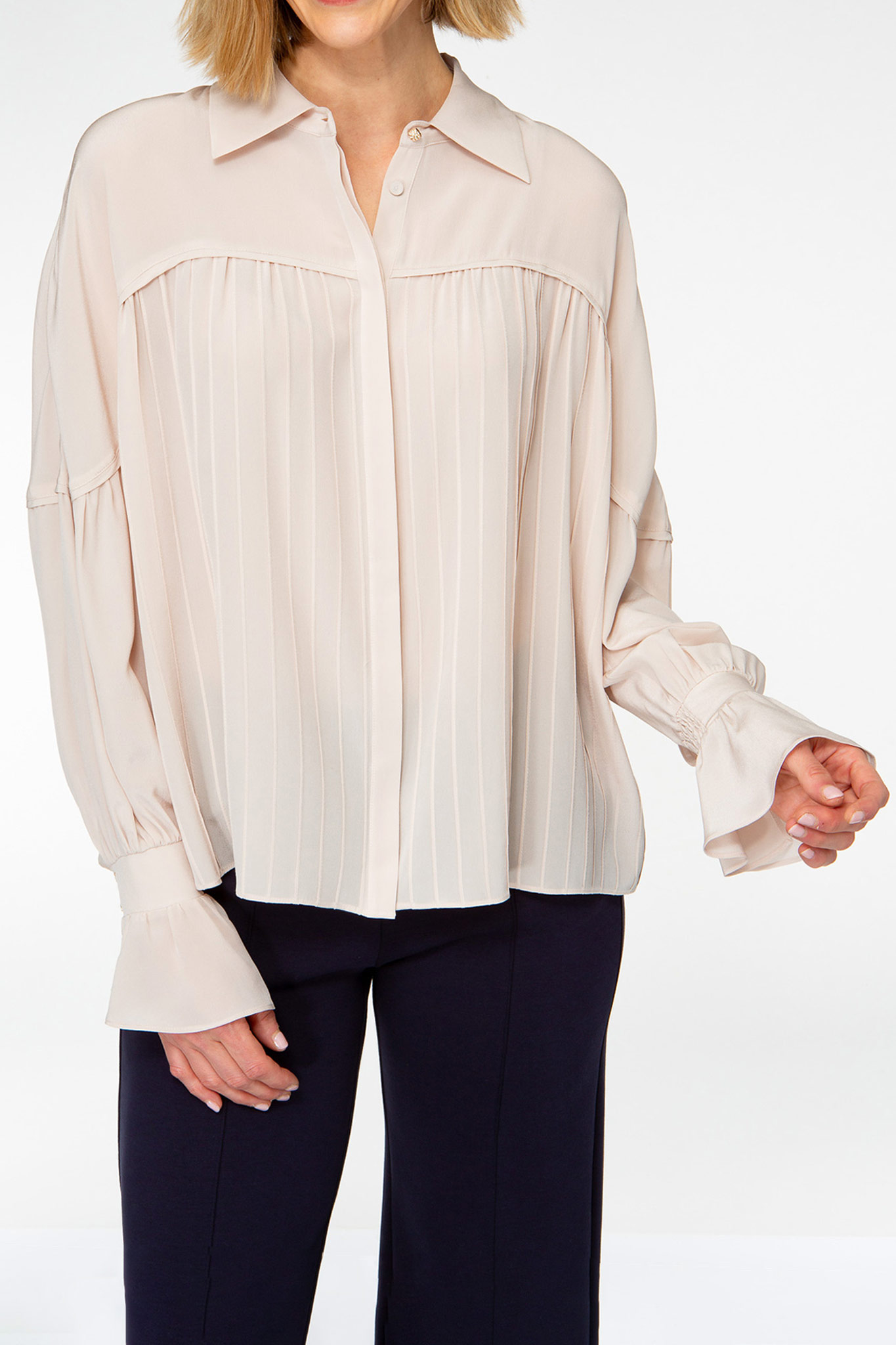 IVI collection rose blouse with pleat detail in the font and back with a golden button at the top made from silk and ruffle details on the sleeve from aw24 collection