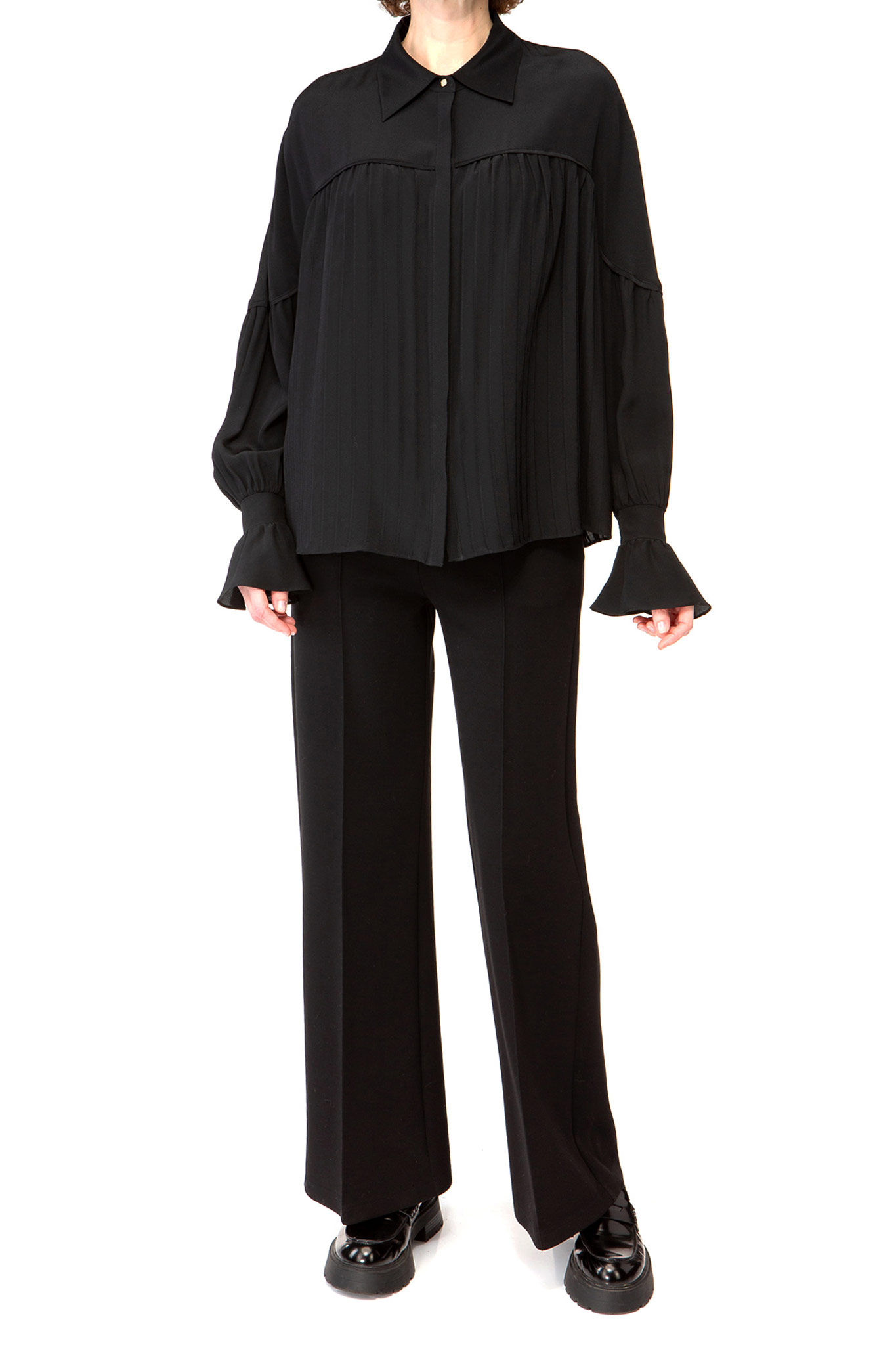 IVI collection black blouse with pleat detail in the font and back with a golden button at the top made from 100% silk from aw24 collection