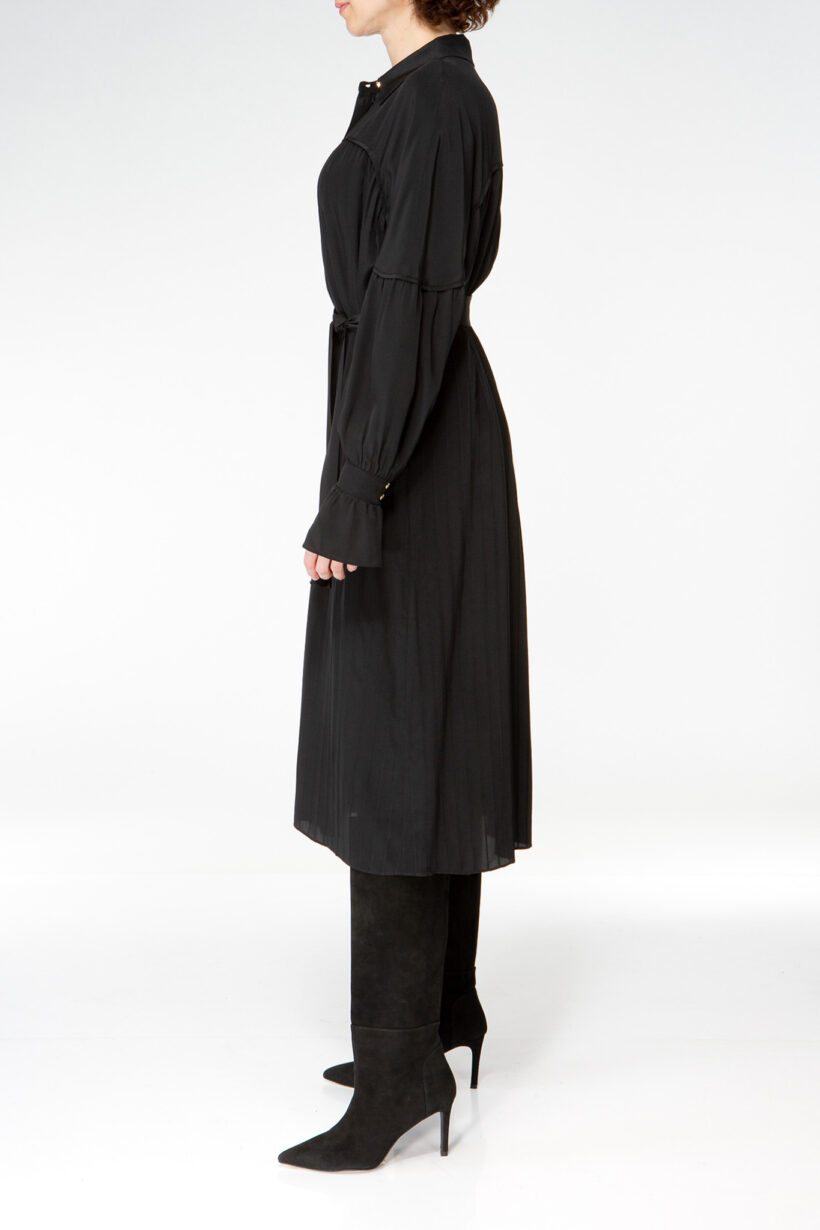 IVI collection black blouse with pleat detail in the font and back with a golden details made from silk and ruffle details on the sleeve from aw24 collection