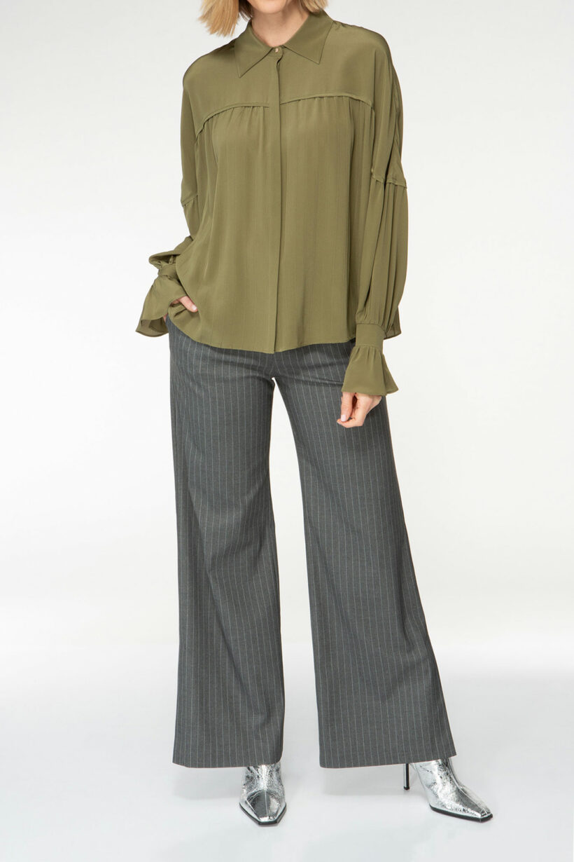 IVI collection olive green blouse with pleat detail in the font and back with a golden button at the top made from 100% silk from aw24 collection