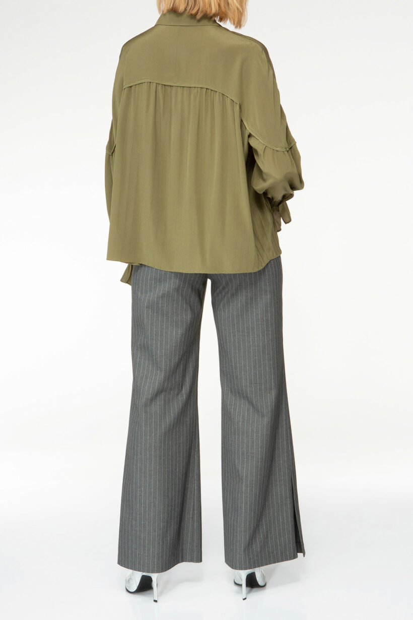 IVI collection olive green blouse with pleat detail in the font and back with a golden button at the top made from 100% silk from aw24 collection