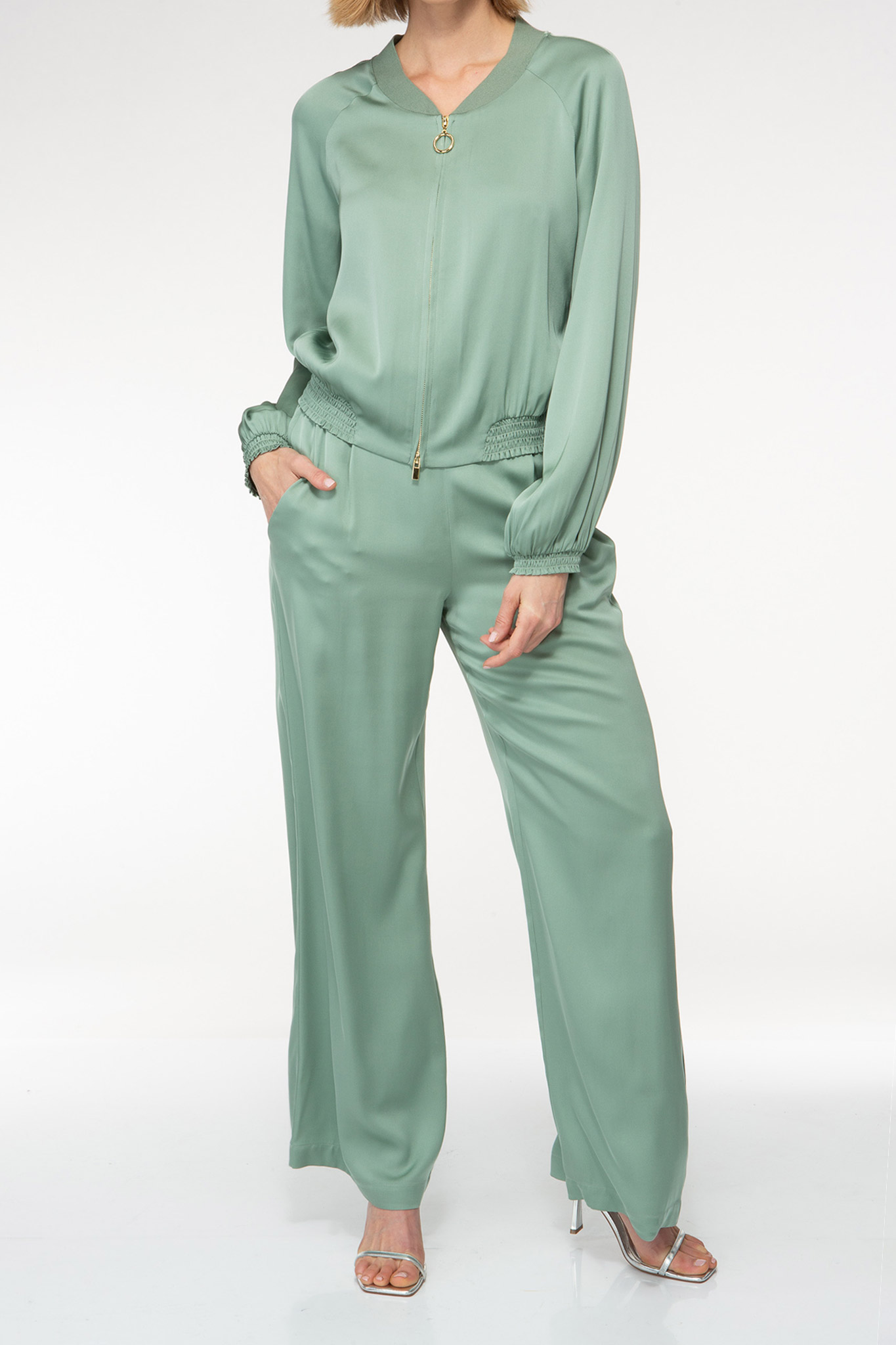 IVI collection sage jacket with gold round zipper and elastic collar and hem from aw24 collection
