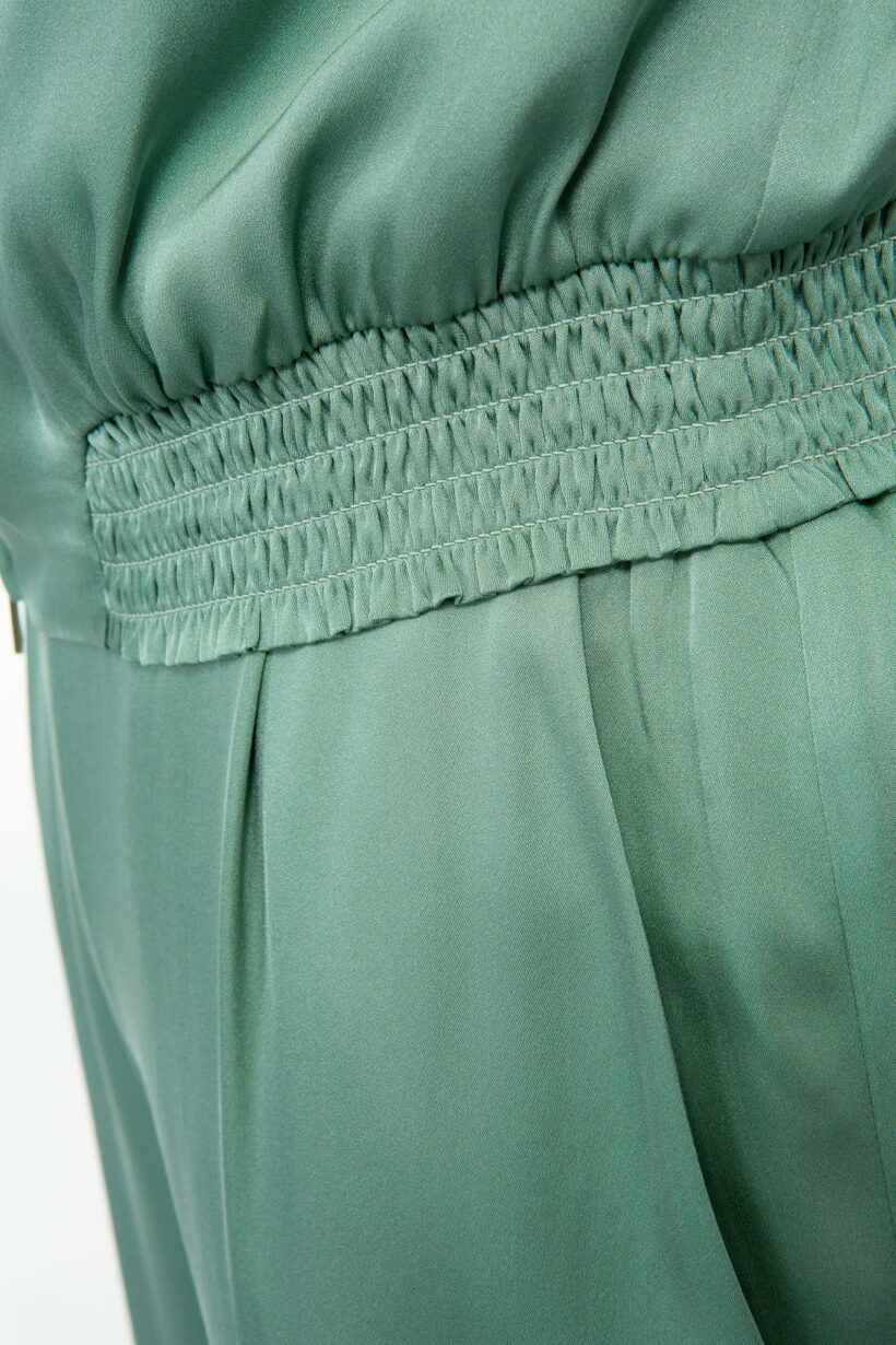 IVI collection sage jacket with gold round zipper and elastic collar and hem from aw24 collection